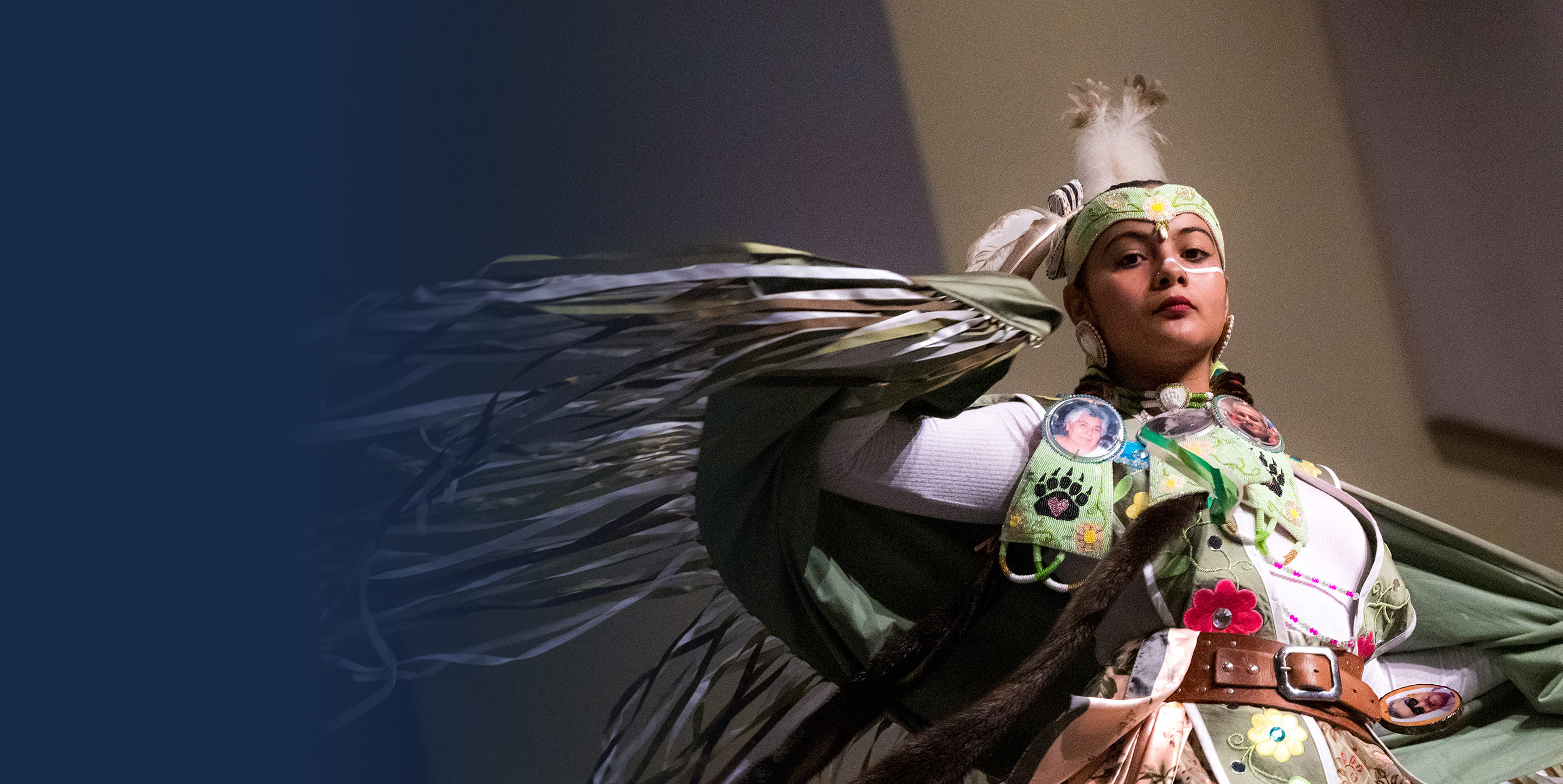 Dancer wearing traditional Native American dress